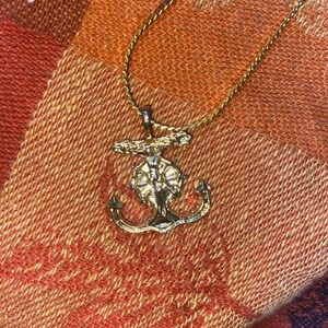Gold Anchor with a cross necklace